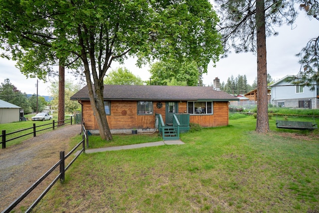 521 Clay St, Thompson Falls, MT 59873 - view of front facade with driveway and a chimney
