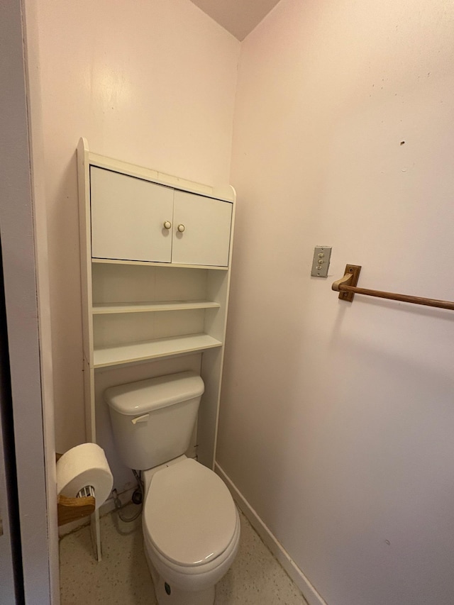 330 N Walnut St, Dillon, MT 59725 - bathroom featuring toilet and baseboards