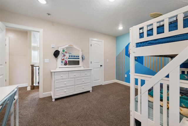 322 Hemlock St, Anaconda, MT 59711 - bedroom featuring dark carpet, baseboards, and recessed lighting