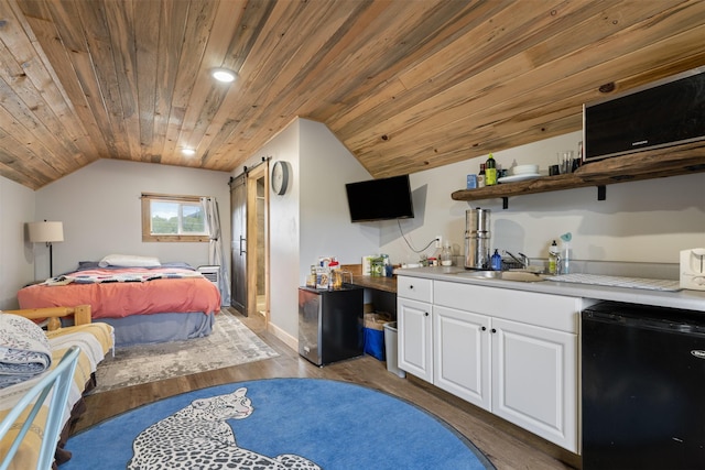 322 Hemlock St, Anaconda, MT 59711 - bedroom featuring fridge, freestanding refrigerator, a sink, wood ceiling, and lofted ceiling