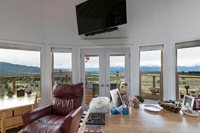 2879 Soft Rock Rd, Corvallis, MT 59828 - sunroom featuring french doors and a mountain view