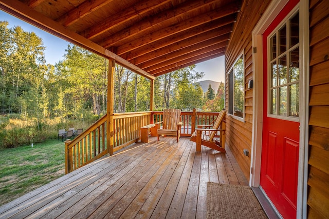 155 Seville Ln, Coram, MT 59913 - wooden terrace featuring a yard