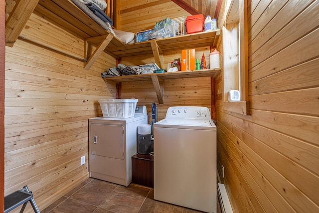 155 Seville Ln, Coram, MT 59913 - laundry area with washer and dryer and wooden walls