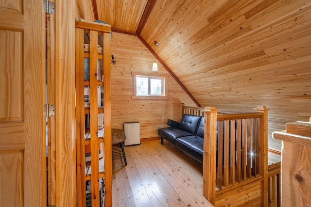 155 Seville Ln, Coram, MT 59913 - sitting room featuring wooden walls, wooden ceiling, wood-type flooring, and lofted ceiling