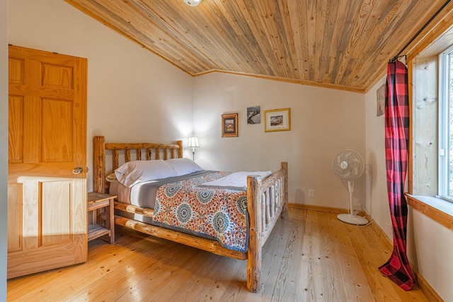 155 Seville Ln, Coram, MT 59913 - bedroom featuring vaulted ceiling, wood ceiling, hardwood / wood-style floors, and ornamental molding