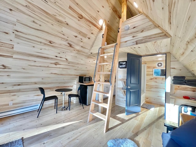155 Seville Ln, Coram, MT 59913 - bedroom featuring wood walls, lofted ceiling, hardwood / wood-style flooring, and wood ceiling