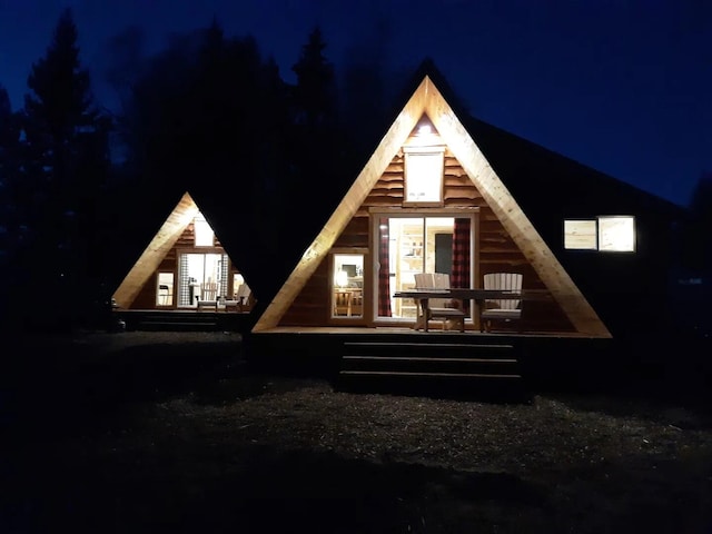 155 Seville Ln, Coram, MT 59913 - view of back of house at night