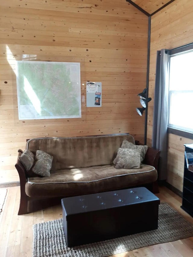 155 Seville Ln, Coram, MT 59913 - sitting room with wood walls, hardwood / wood-style floors, and vaulted ceiling