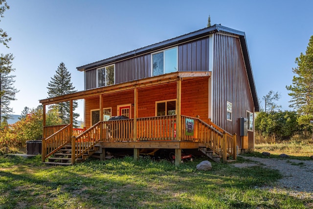 155 Seville Ln, Coram, MT 59913 - back of property with a deck and stairway
