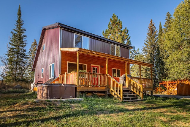 155 Seville Ln, Coram, MT 59913 - rear view of property with a deck and a yard