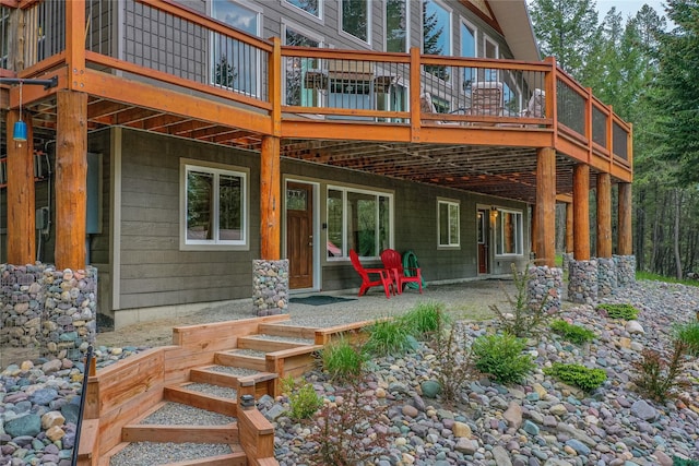 277 Ridge Loop Rd, Rexford, MT 59930 - rear view of house featuring a deck