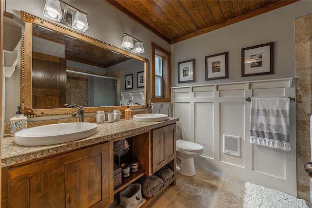 277 Ridge Loop Rd, Rexford, MT 59930 - bathroom featuring wooden ceiling, crown molding, a stall shower, heating unit, and toilet