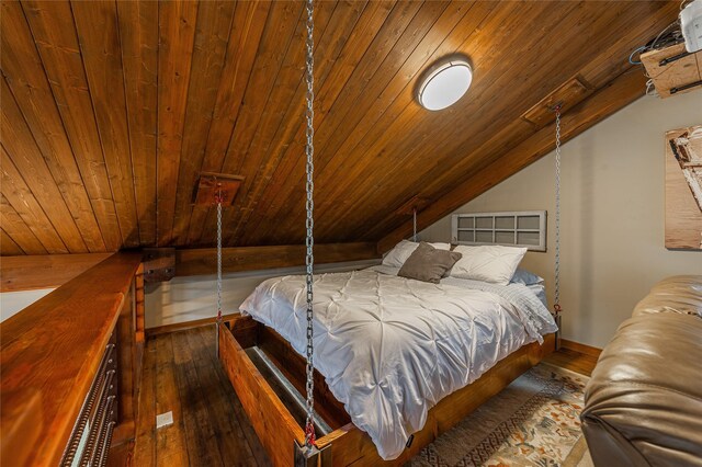 277 Ridge Loop Rd, Rexford, MT 59930 - bedroom featuring wood ceiling, vaulted ceiling, hardwood / wood-style flooring, and baseboards