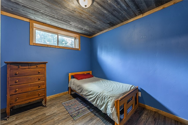 277 Ridge Loop Rd, Rexford, MT 59930 - bedroom featuring baseboards, wood finished floors, and wooden ceiling