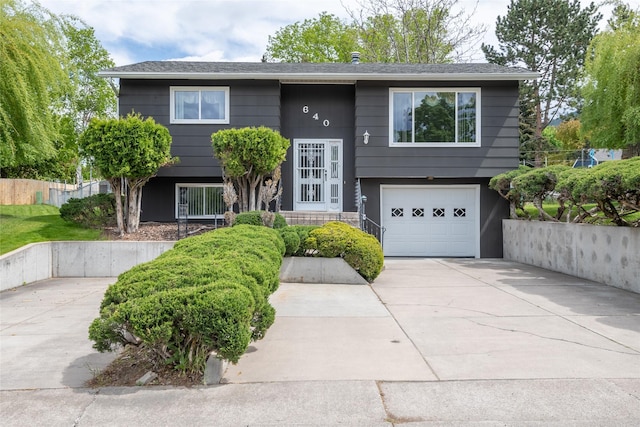 640 W Crestline Dr, Missoula, MT 59803 - split foyer home featuring a garage and driveway