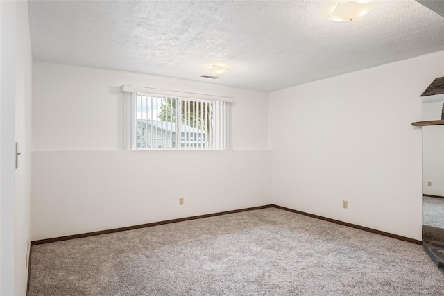 640 W Crestline Dr, Missoula, MT 59803 - carpeted spare room with a textured ceiling and baseboards