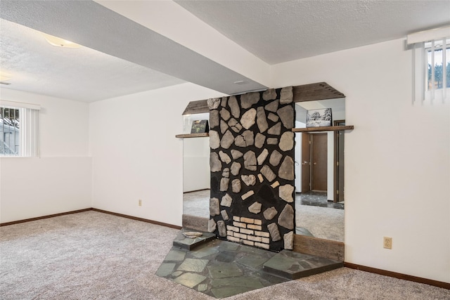 640 W Crestline Dr, Missoula, MT 59803 - basement featuring carpet, baseboards, and a textured ceiling