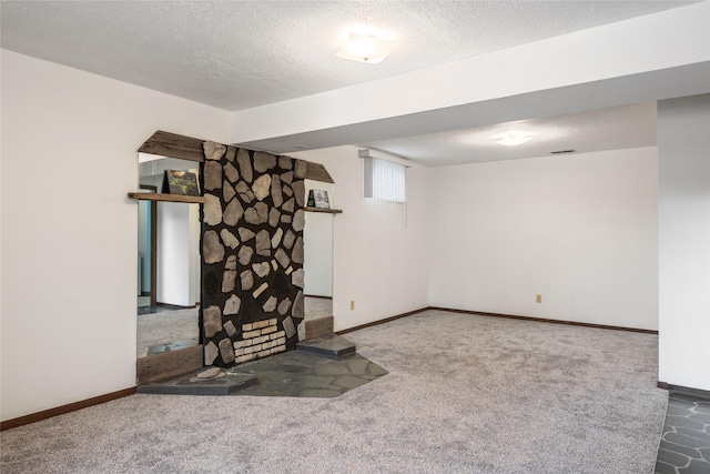 640 W Crestline Dr, Missoula, MT 59803 - basement featuring carpet flooring, baseboards, and a textured ceiling