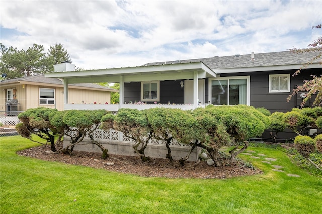 640 W Crestline Dr, Missoula, MT 59803 - view of front facade featuring a front lawn and a shingled roof