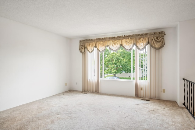 640 W Crestline Dr, Missoula, MT 59803 - carpeted spare room with a textured ceiling