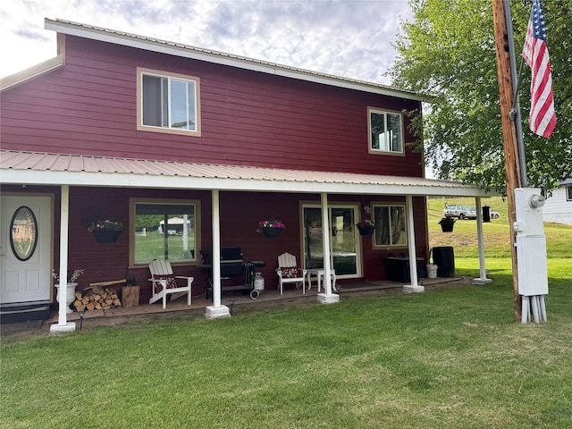 614 Johnson Ln, Superior, MT 59872 - back of property featuring a porch and a lawn