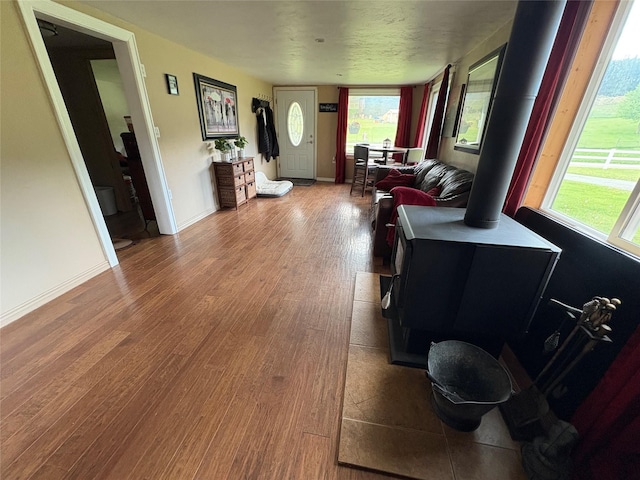 614 Johnson Ln, Superior, MT 59872 - living room with wood finished floors, healthy amount of natural light, and baseboards