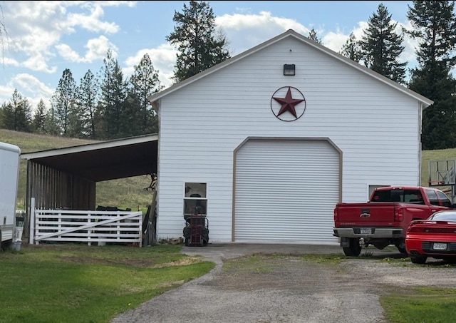 614 Johnson Ln, Superior, MT 59872 - detached garage featuring driveway