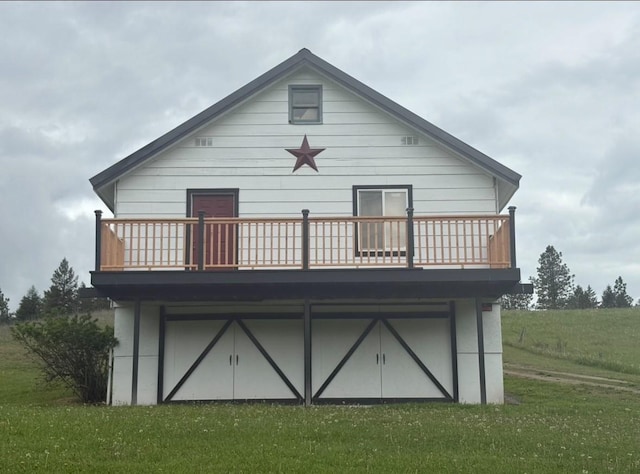 614 Johnson Ln, Superior, MT 59872 - back of property with a lawn and a deck