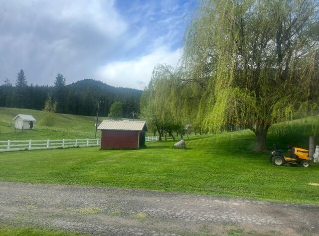 614 Johnson Ln, Superior, MT 59872 - view of yard featuring a wooded view and a view of rural / pastoral area