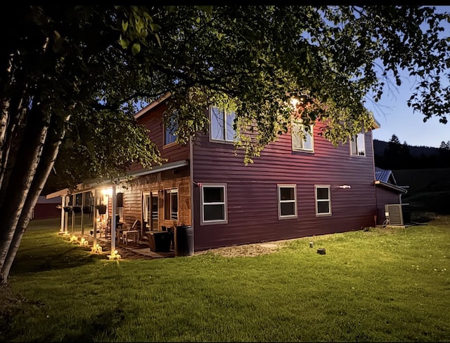 614 Johnson Ln, Superior, MT 59872 - rear view of property with central AC, a yard, and a patio