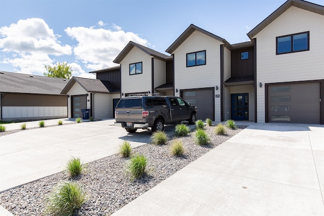 4394 Brookside Ln, Bozeman, MT 59718 - view of front of property featuring concrete driveway and an attached garage