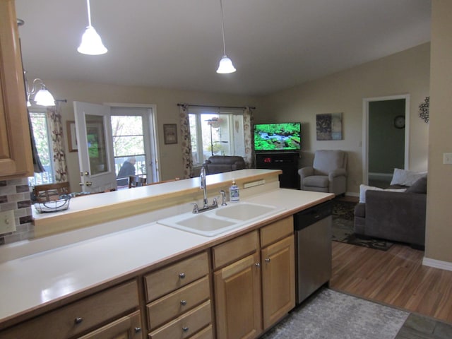 2220 Alpine Dr, Helena, MT 59601 - kitchen with a sink, dishwasher, open floor plan, light countertops, and wood finished floors
