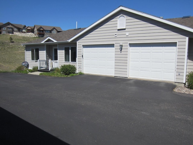 2220 Alpine Dr, Helena, MT 59601 - single story home featuring driveway, a garage, and a shingled roof