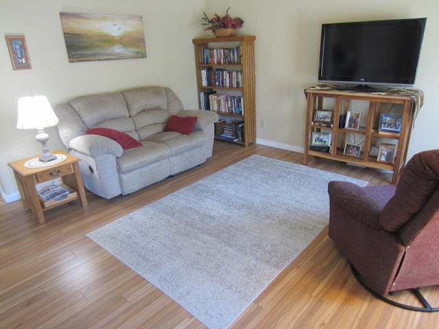 2220 Alpine Dr, Helena, MT 59601 - living room featuring baseboards and wood finished floors