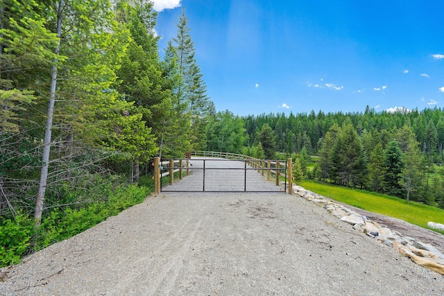 101 Little Mountain Rd, Whitefish, MT 59937 - gate with a forest view