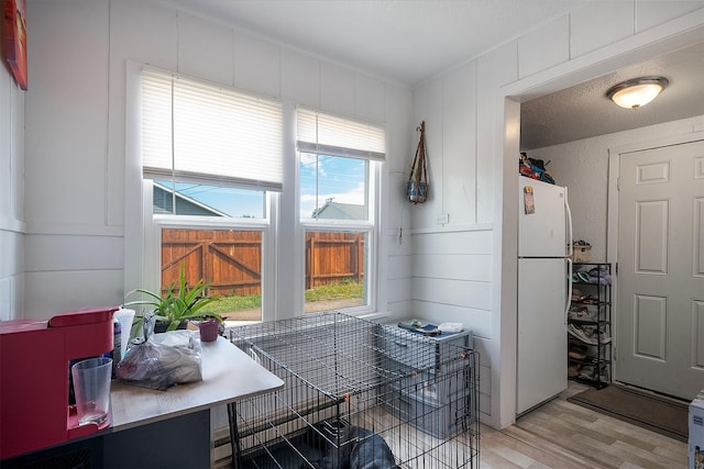 705 3rd St W, Polson, MT 59860 - dining area featuring light wood-style floors and a decorative wall