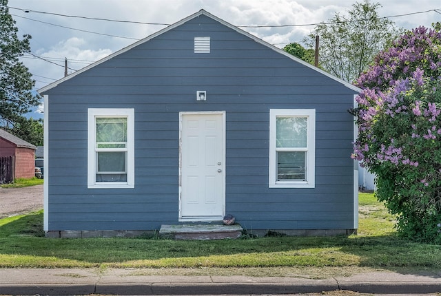 705 3rd St W, Polson, MT 59860 - view of front of house with a front lawn