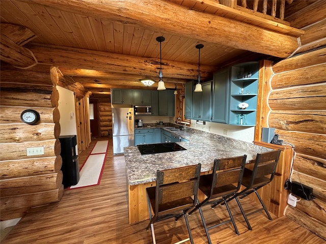 3966 Main Boulder Rd, Big Timber, MT 59011 - kitchen with stainless steel appliances, a sink, a peninsula, log walls, and open shelves