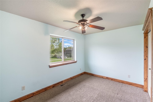 10 Canyon Breeze Ct, Stevensville, MT 59870 - empty room with carpet flooring, baseboards, and ceiling fan