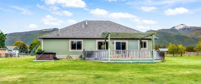 10 Canyon Breeze Ct, Stevensville, MT 59870 - back of house featuring a deck with mountain view and a pergola