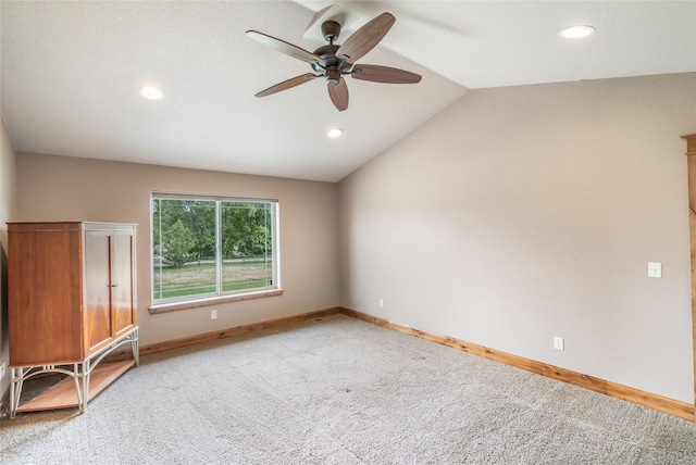 10 Canyon Breeze Ct, Stevensville, MT 59870 - spare room featuring carpet, ceiling fan, baseboards, vaulted ceiling, and recessed lighting