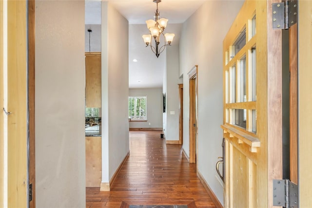 10 Canyon Breeze Ct, Stevensville, MT 59870 - hall with hardwood / wood-style flooring, a chandelier, baseboards, and recessed lighting