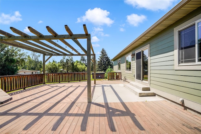 10 Canyon Breeze Ct, Stevensville, MT 59870 - wooden deck with entry steps and a pergola