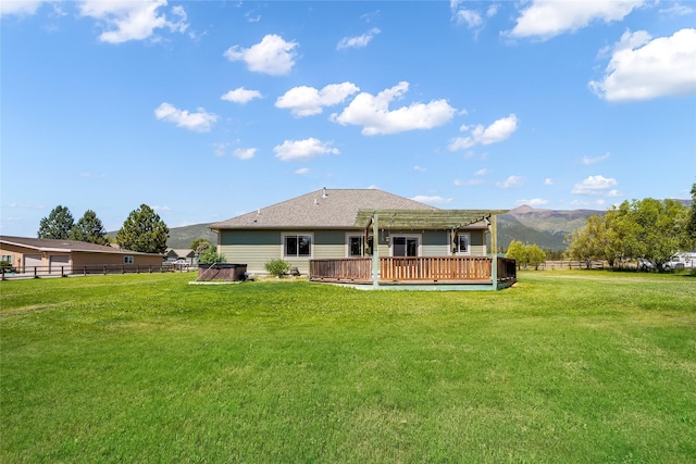 10 Canyon Breeze Ct, Stevensville, MT 59870 - rear view of property featuring a deck with mountain view and a pergola