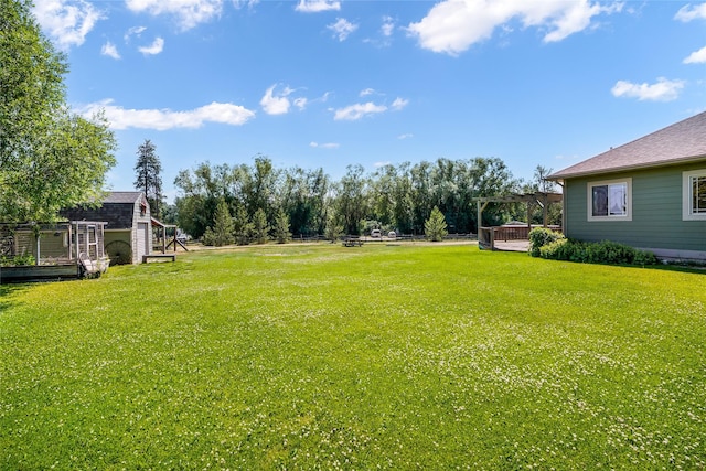 10 Canyon Breeze Ct, Stevensville, MT 59870 - view of grassy yard featuring a pergola