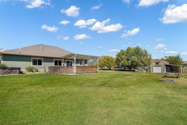 10 Canyon Breeze Ct, Stevensville, MT 59870 - view of grassy yard with a pergola, a deck, and a garage