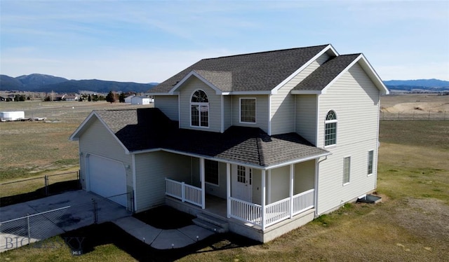 4160 Geneva Ln, Butte, MT 59701 - view of front of house featuring covered porch, a shingled roof, and a mountain view