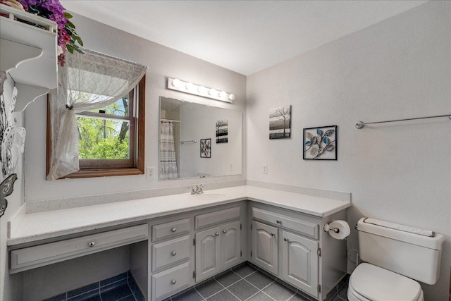 70 Dune Hill Ln, Great Falls, MT 59404 - bathroom with tile patterned flooring, toilet, vanity, and a shower with curtain