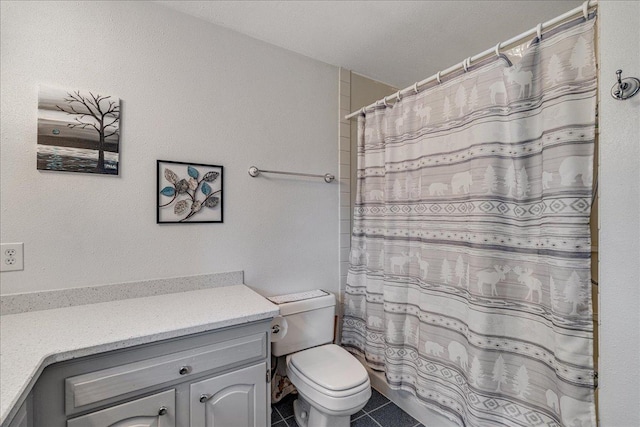 70 Dune Hill Ln, Great Falls, MT 59404 - bathroom featuring toilet, vanity, tile patterned flooring, and a shower with curtain