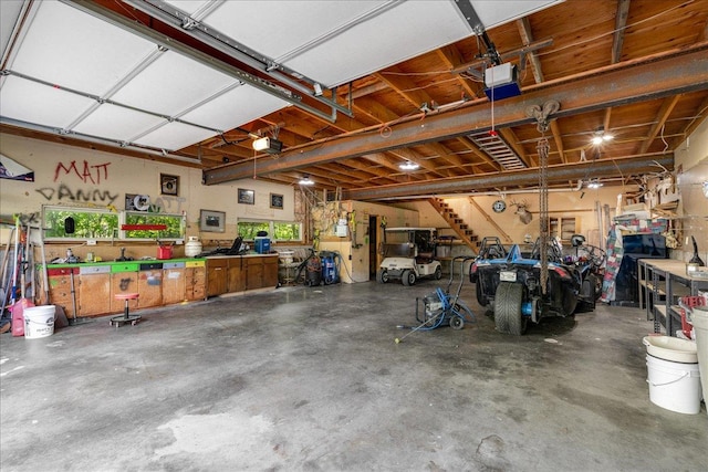 70 Dune Hill Ln, Great Falls, MT 59404 - garage with a garage door opener and a workshop area